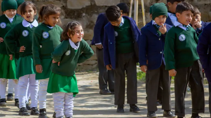 Kids lining up at a school managed by Kashmir Education Foundation Kids lining up at a school managed by Kashmir Education Foundation